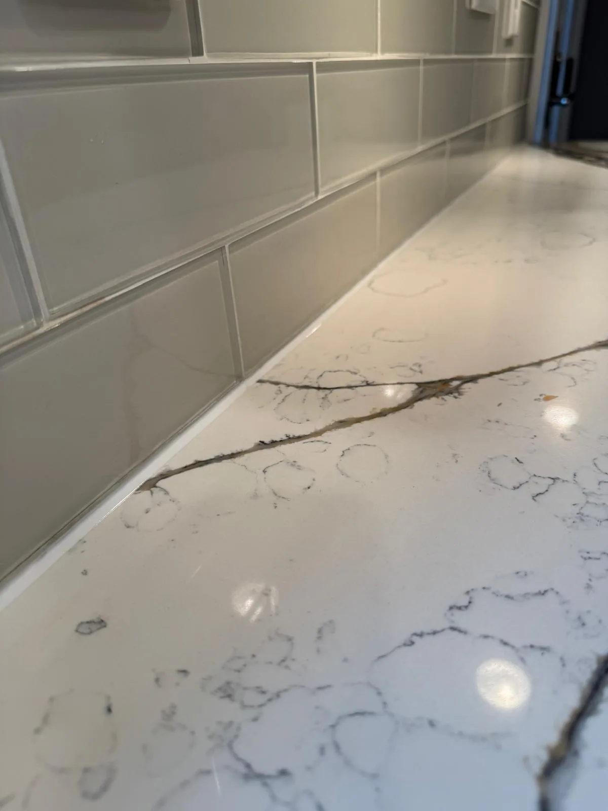 Grey subway tile kitchen backsplash