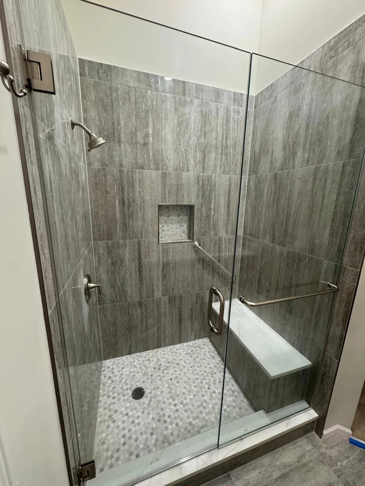 Grey travertine shower